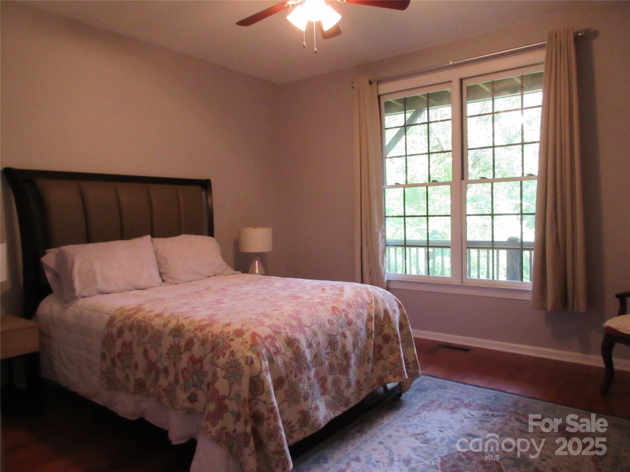 34 West Rambling Creek Tryon, NC 28782 - Photo 43 of 48 a bedroom with a bed and a window