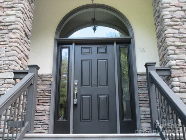 a view of a entryway door of house