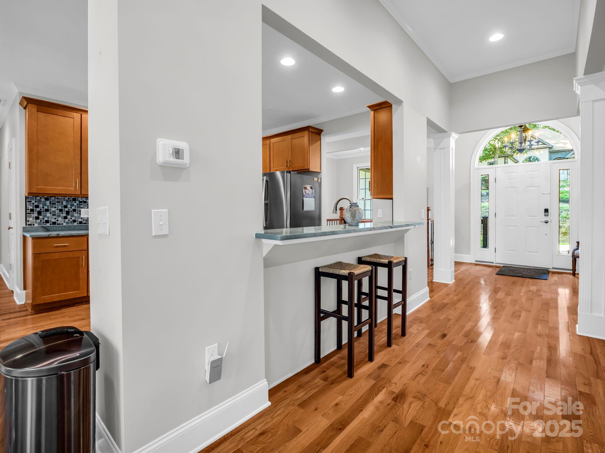 34 West Rambling Creek Tryon, NC 28782 - Photo 6 of 48 a view of a hallway with wooden floor and entryway
