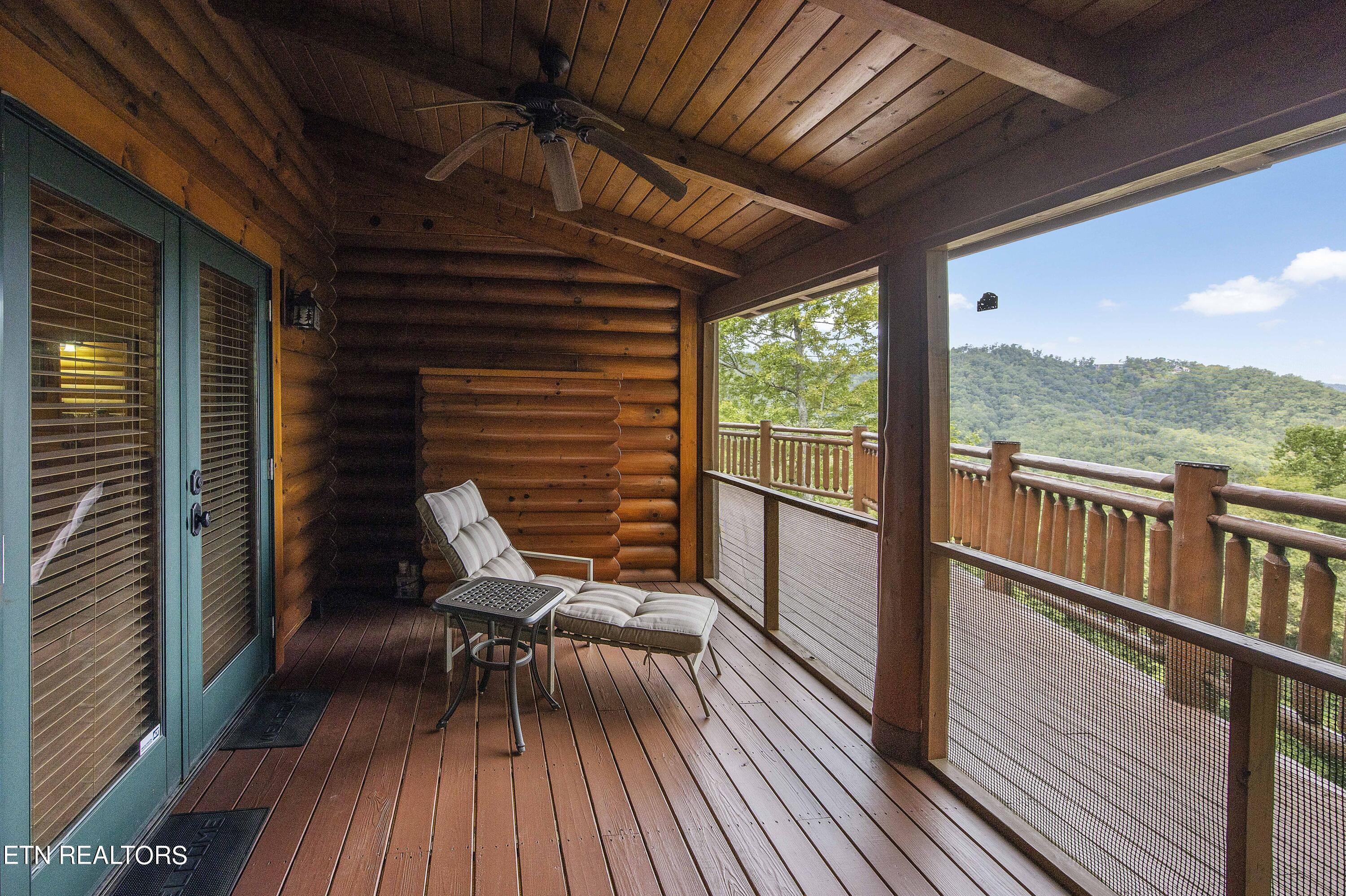 4565 Long Rifle Road Sevierville, TN 37862 - Photo 17 of 51 Screened Porch Off Master Bedroom