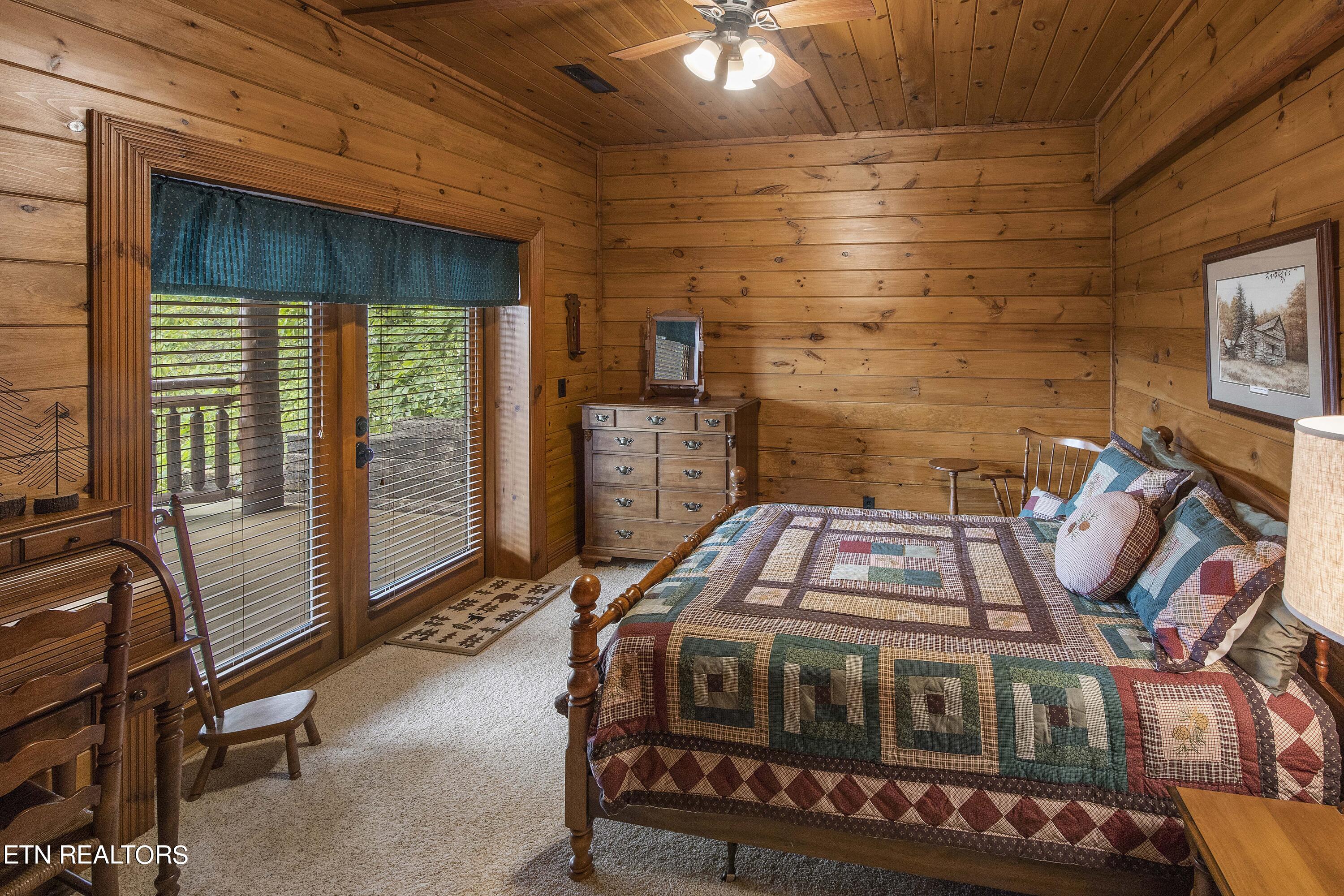 4565 Long Rifle Road Sevierville, TN 37862 - Photo 33 of 51 Lower Level Guest Room