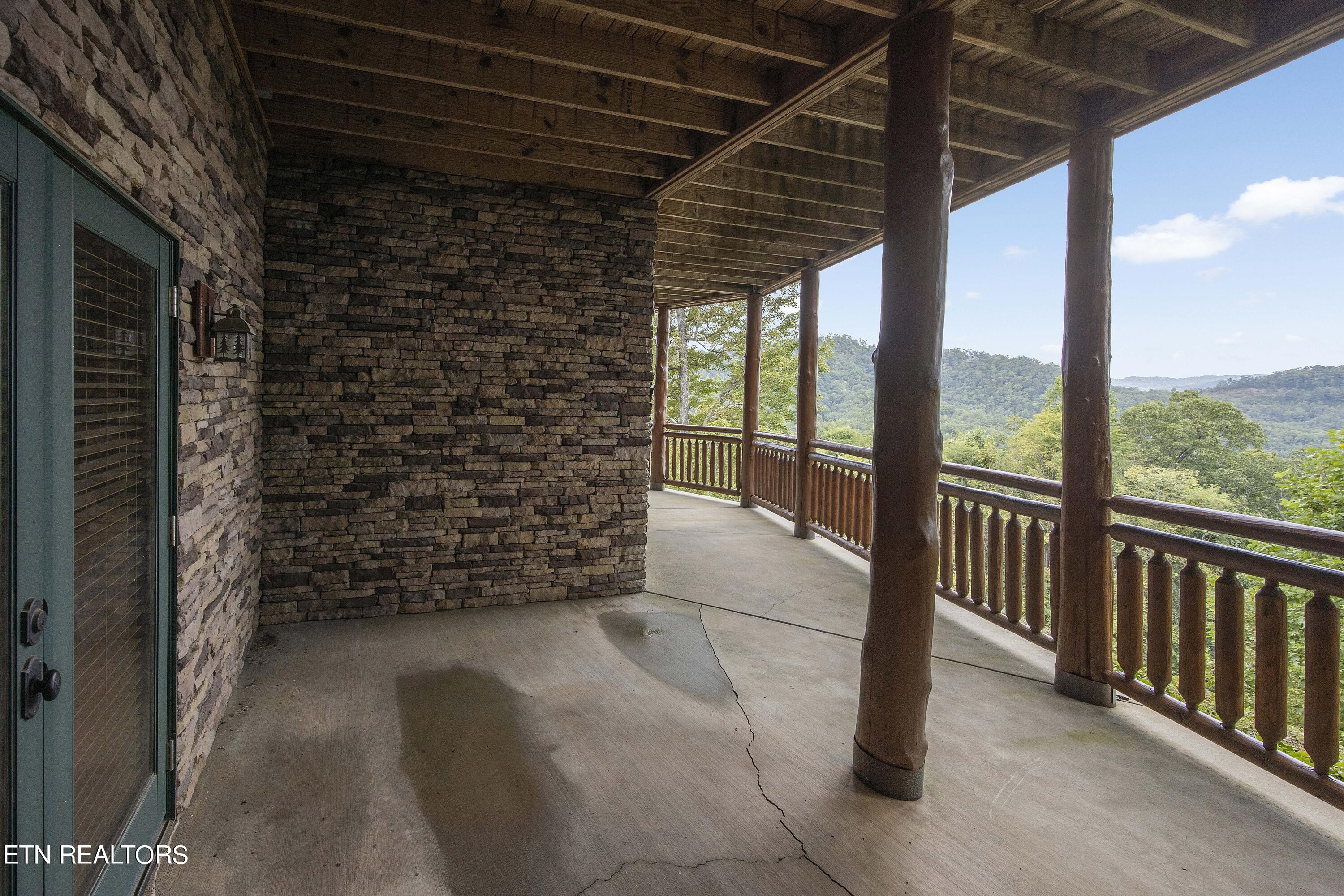 4565 Long Rifle Road Sevierville, TN 37862 - Photo 42 of 51 Covered basement porch