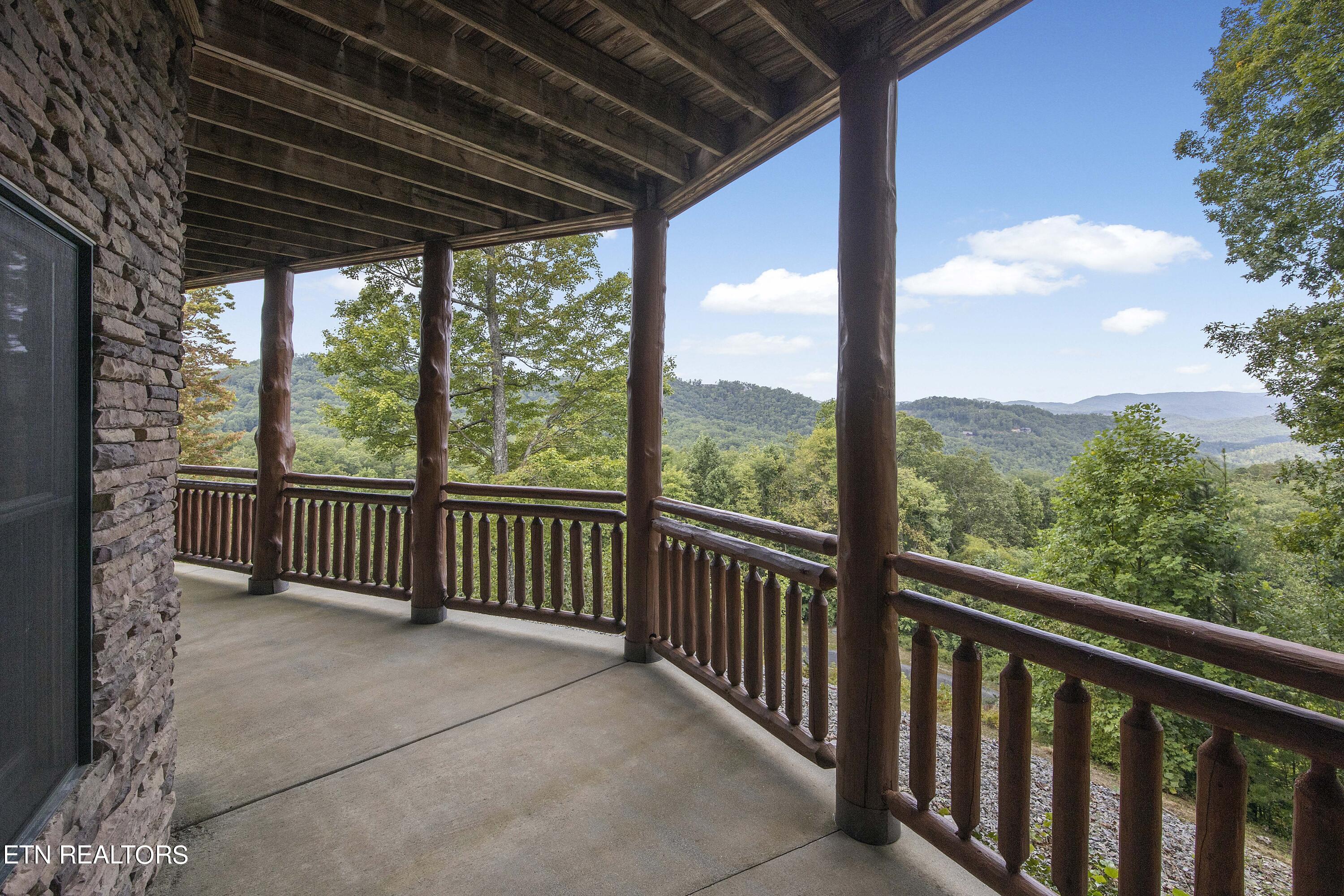 4565 Long Rifle Road Sevierville, TN 37862 - Photo 43 of 51 Wrap around basement porch