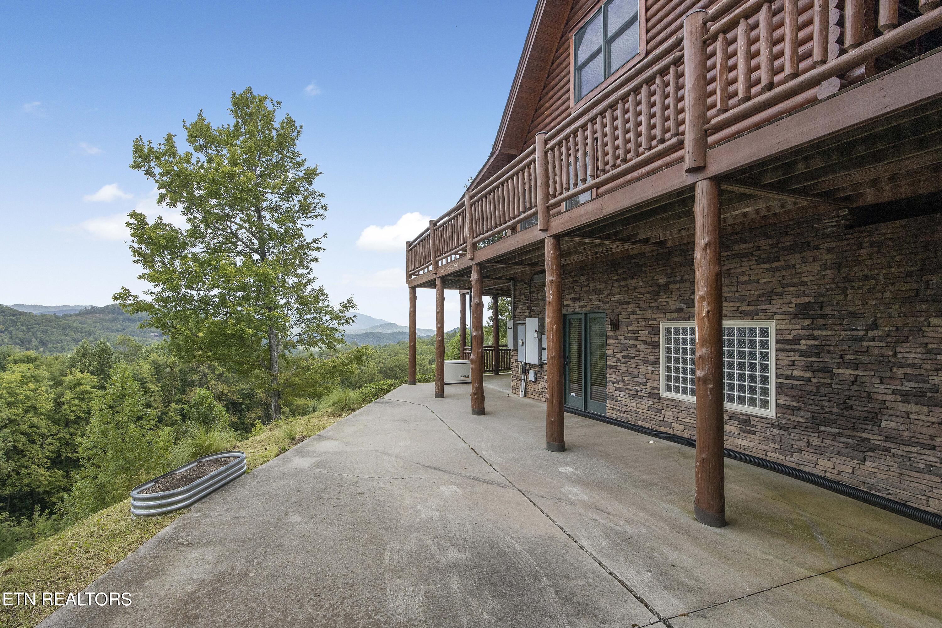 4565 Long Rifle Road Sevierville, TN 37862 - Photo 44 of 51 Lower driveway to basement level