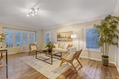 a stove top oven sitting inside of a kitchen