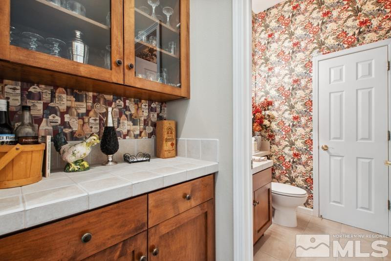 1825 Caughlin Creek Road Reno, NV 89519 - Photo 17 of 40 a view of bathroom with a sink and a toilet