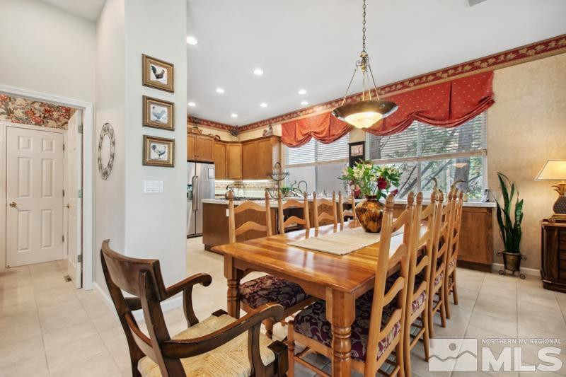 1825 Caughlin Creek Road Reno, NV 89519 - Photo 10 of 40 a dinning table and chairs in a room