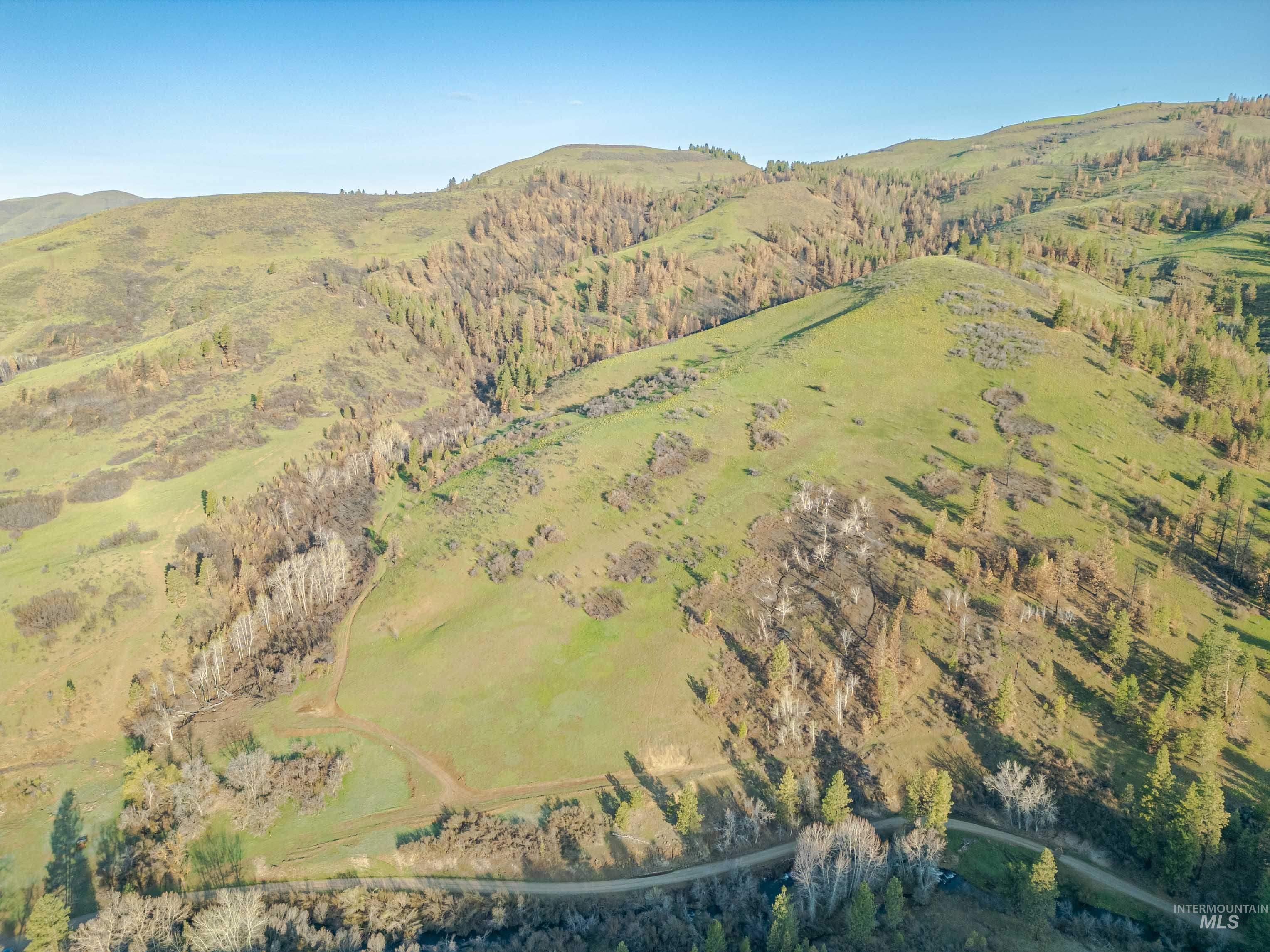 Tbd Tbd Ola Ola, ID 83657 - Photo 12 of 19 Aerial overview of property's location featuring mountains