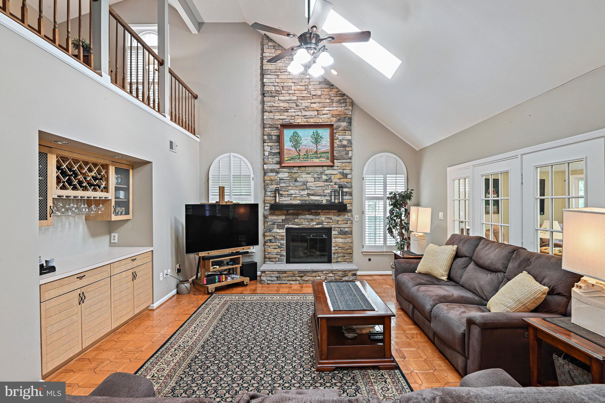 9830 Faust Drive Vienna, VA 22182 - Photo 19 of 75 Custom stonework anchors the living space