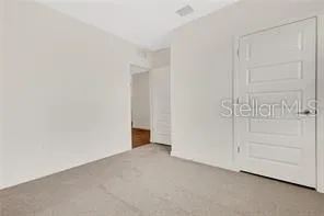 an empty room with cabinet