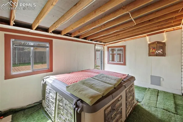 a house with a bench in patio