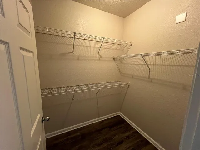 a room with furniture and a large window