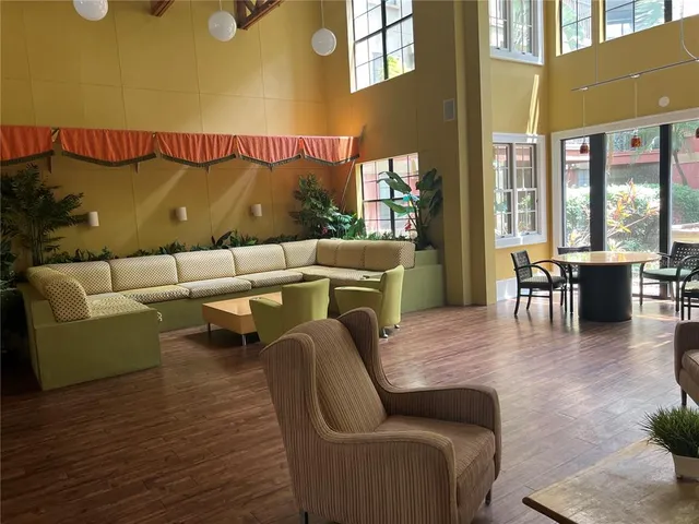 a view of balcony with furniture