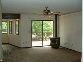 8026 East Barbara Road, Unit 1 Prescott Valley, AZ 86314 - Photo 10 of 10 a view of a livingroom with a ceiling fan and window