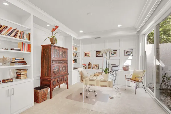 a bathroom with a double vanity sink mirror and