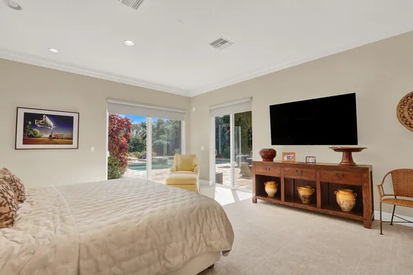 a view of a backyard with furniture