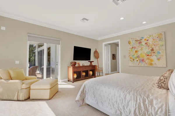 a view of a yard with a table and chairs