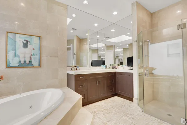 a view of a house with swimming pool and sitting area