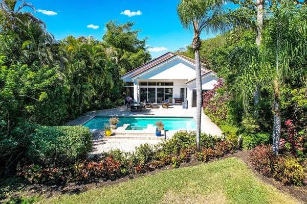 an aerial view of house with yard
