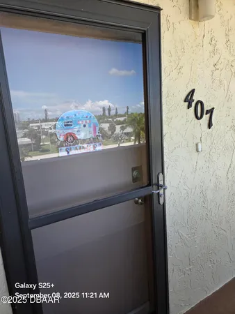 a kitchen with stainless steel appliances granite countertop a sink stove and microwave