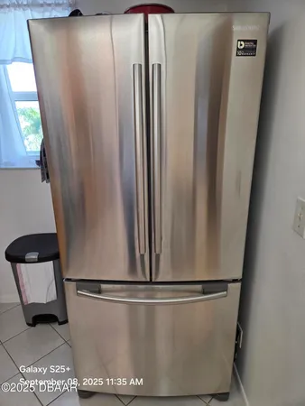 a view of a hallway with washer and dryer