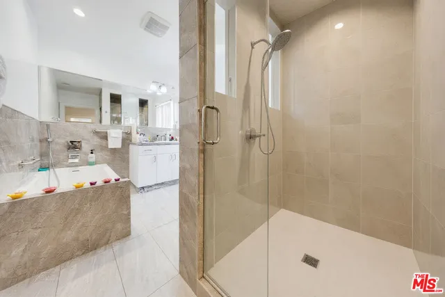 a kitchen that has a sink and a stove in it