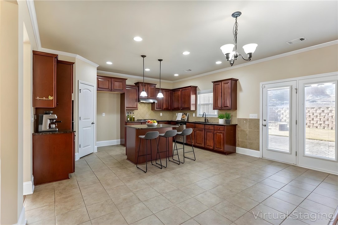 1005 Winmar Drive Anderson, SC 29621 - Photo 5 of 50 This spacious kitchen offers a central island and convenient outdoor access for seamless entertaining.