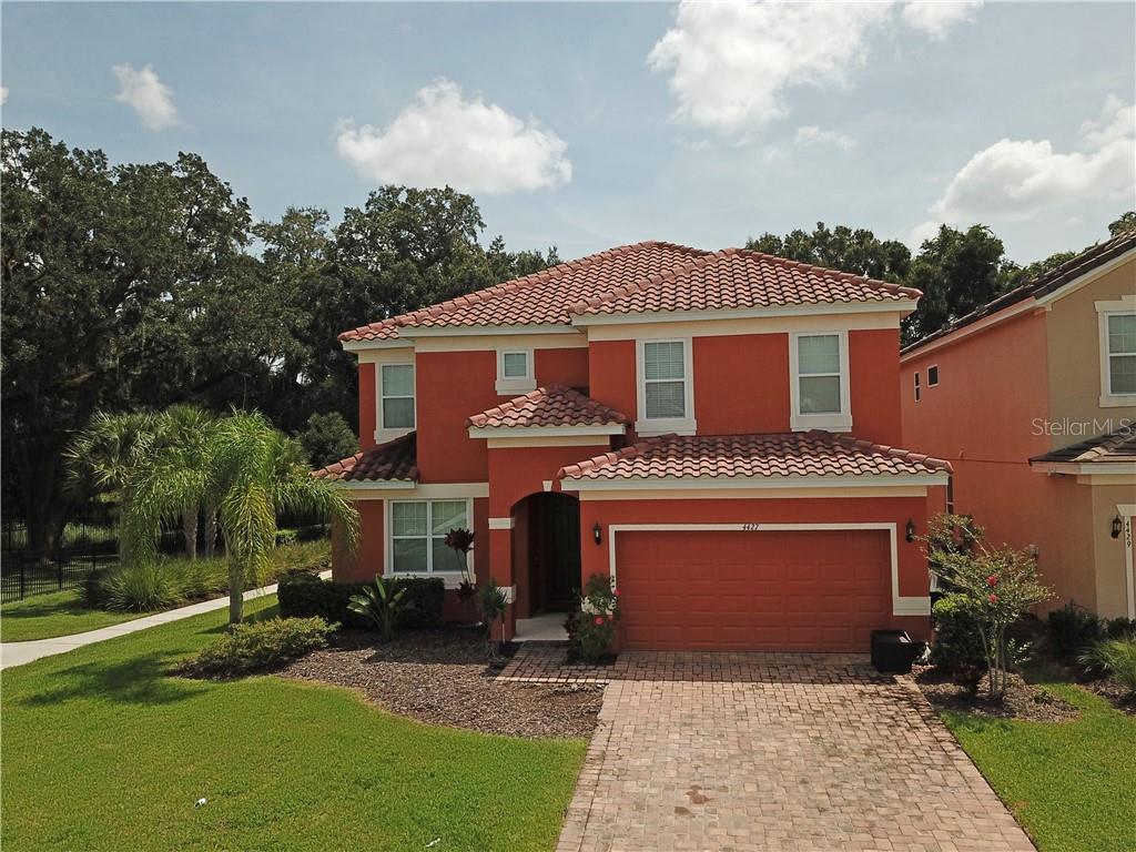 front view of house with a yard