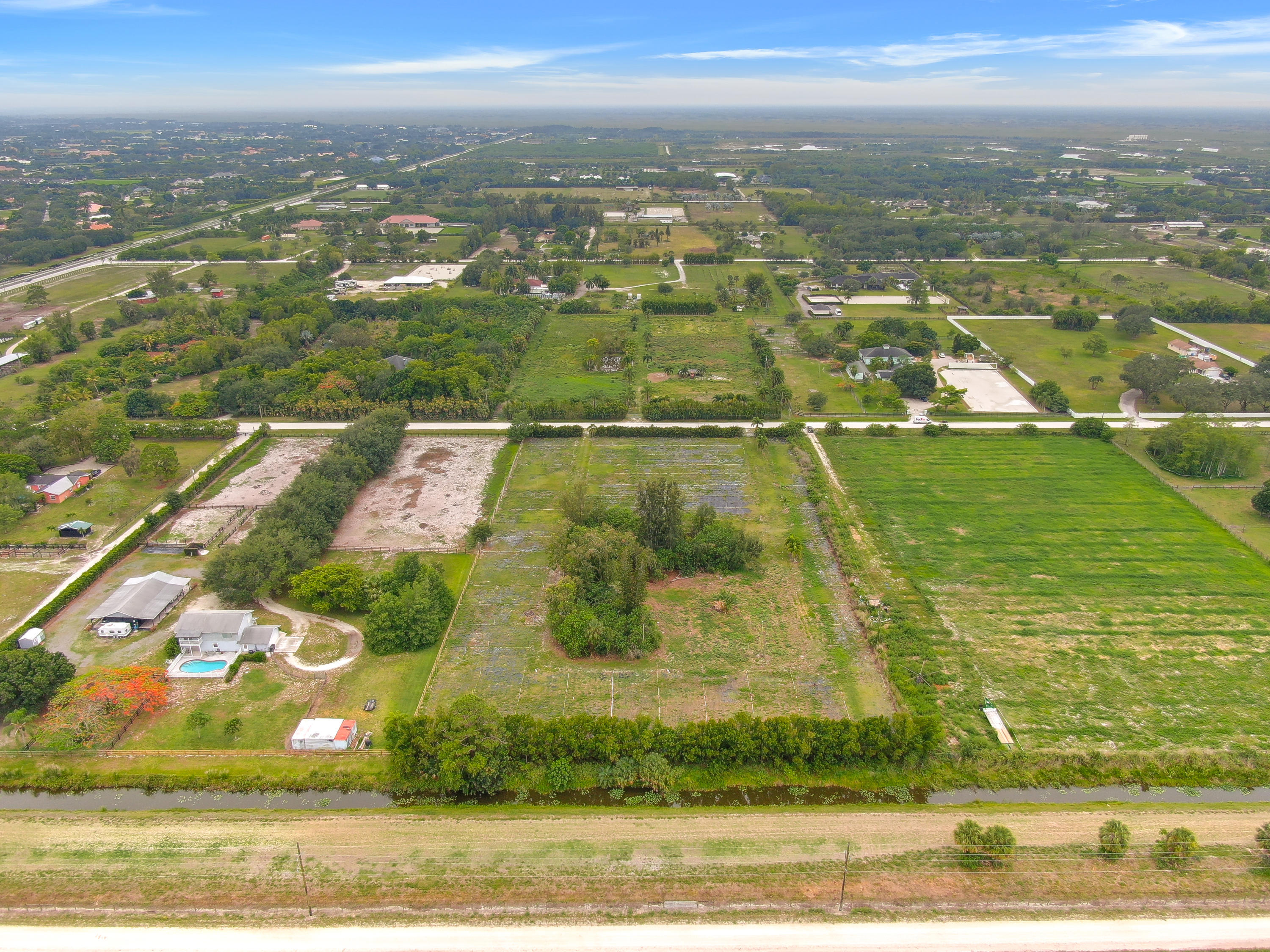 16295 Rustic Road Wellington, FL 33470 - Photo 1 of 6 a view of a city