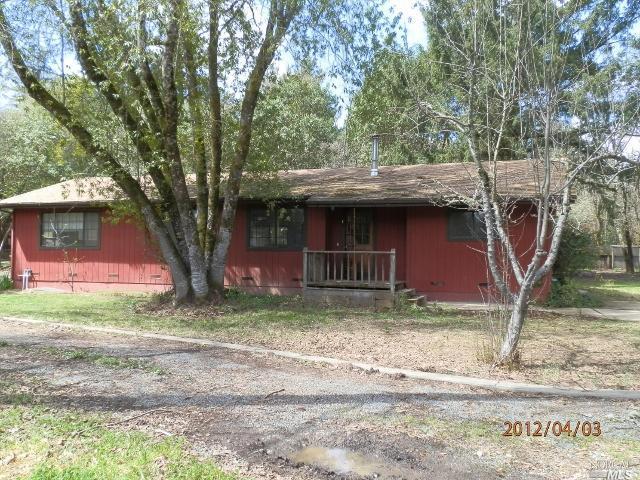 2391 Rancheria Road Redwood Valley, CA 95470 - Photo 1 of 1 a front view of a house with garden