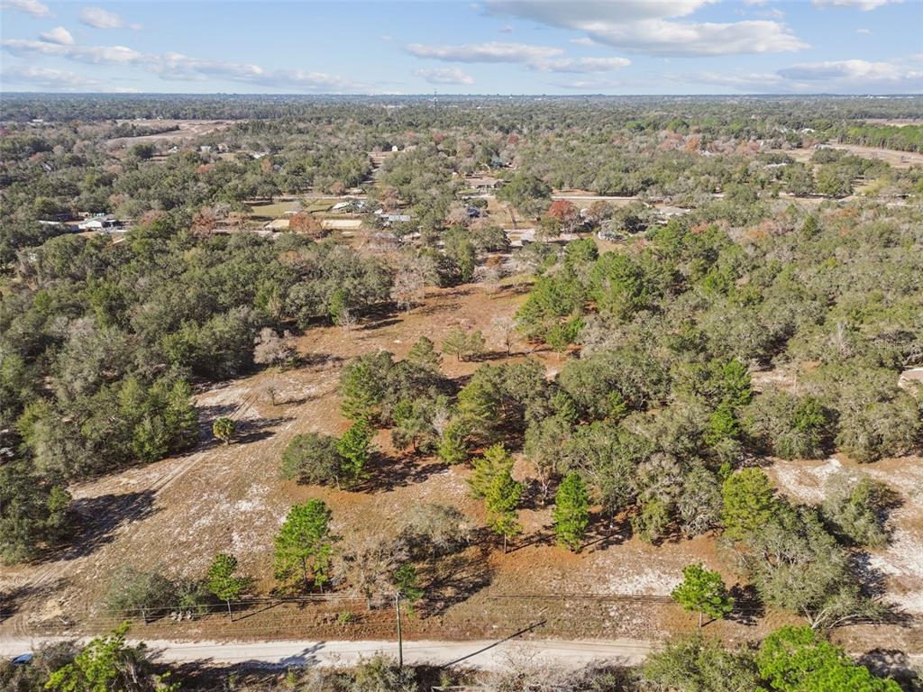 14459 Coyote Road Hudson, FL 34669 - Photo 27 of 55 an aerial view of residential houses with outdoor space