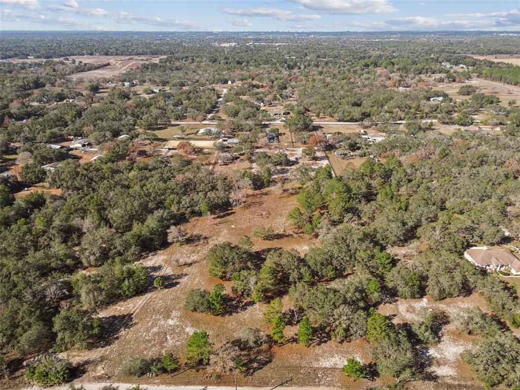 14459 Coyote Road Hudson, FL 34669 - Photo 30 of 55 a view of a city with green field