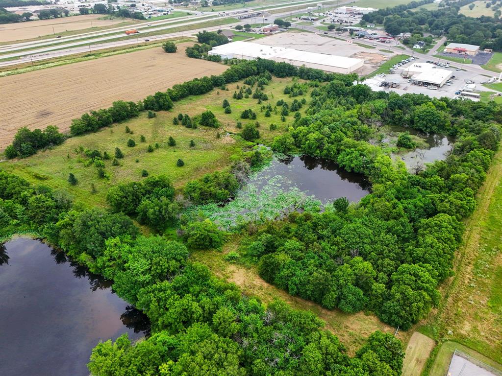 0 West White Street Bonham, TX 75418 - Photo 7 of 13 a view of a yard with plants