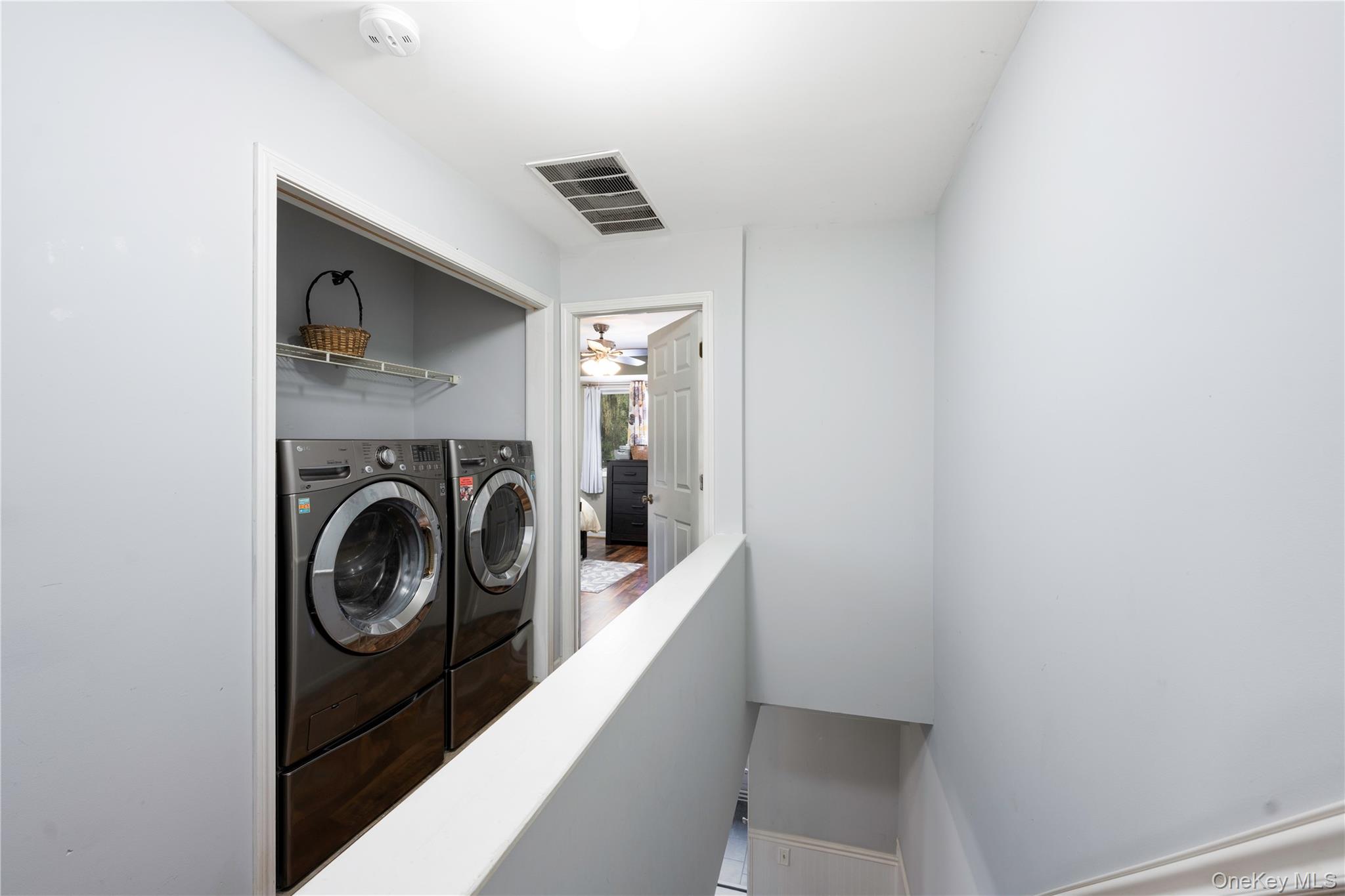 5704 Manor Drive Peekskill, NY 10566 - Photo 11 of 39 a view of a hallway with washer and dryer