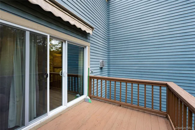 a view of balcony with furniture