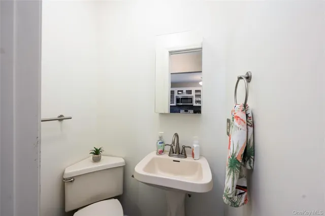 a view of a hallway with washer and dryer