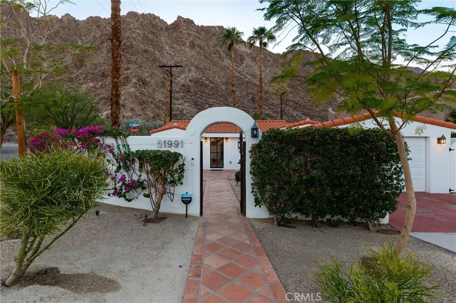 a view of a garden with a pathway