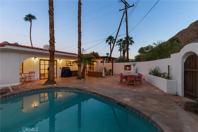 a view of a house with a swimming pool