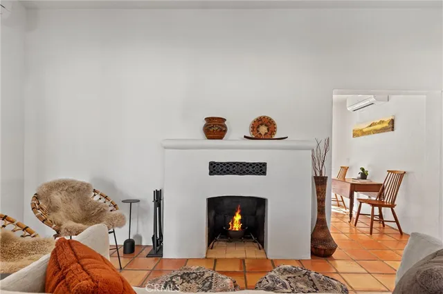 a living room with a couch and a table