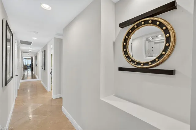 a view of a hallway with washer and dryer
