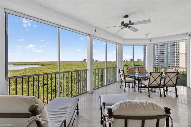 a view of a dining room and furniture window and outside view
