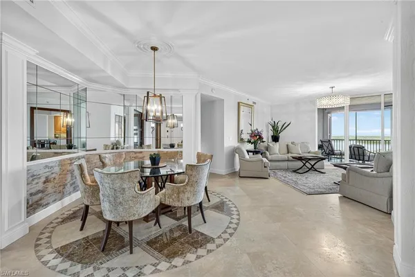 a view of a dining room with furniture