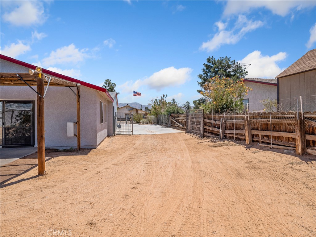14060 Osage Road Apple Valley, CA 92307 - Photo 29 of 39 a view of a backyard