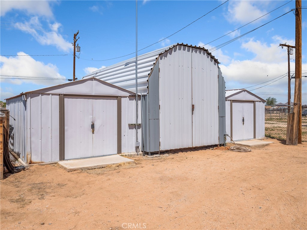 14060 Osage Road Apple Valley, CA 92307 - Photo 3 of 39 a view of a house with a backyard