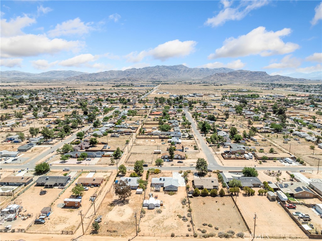 14060 Osage Road Apple Valley, CA 92307 - Photo 39 of 39 an aerial view of residential building with parking space