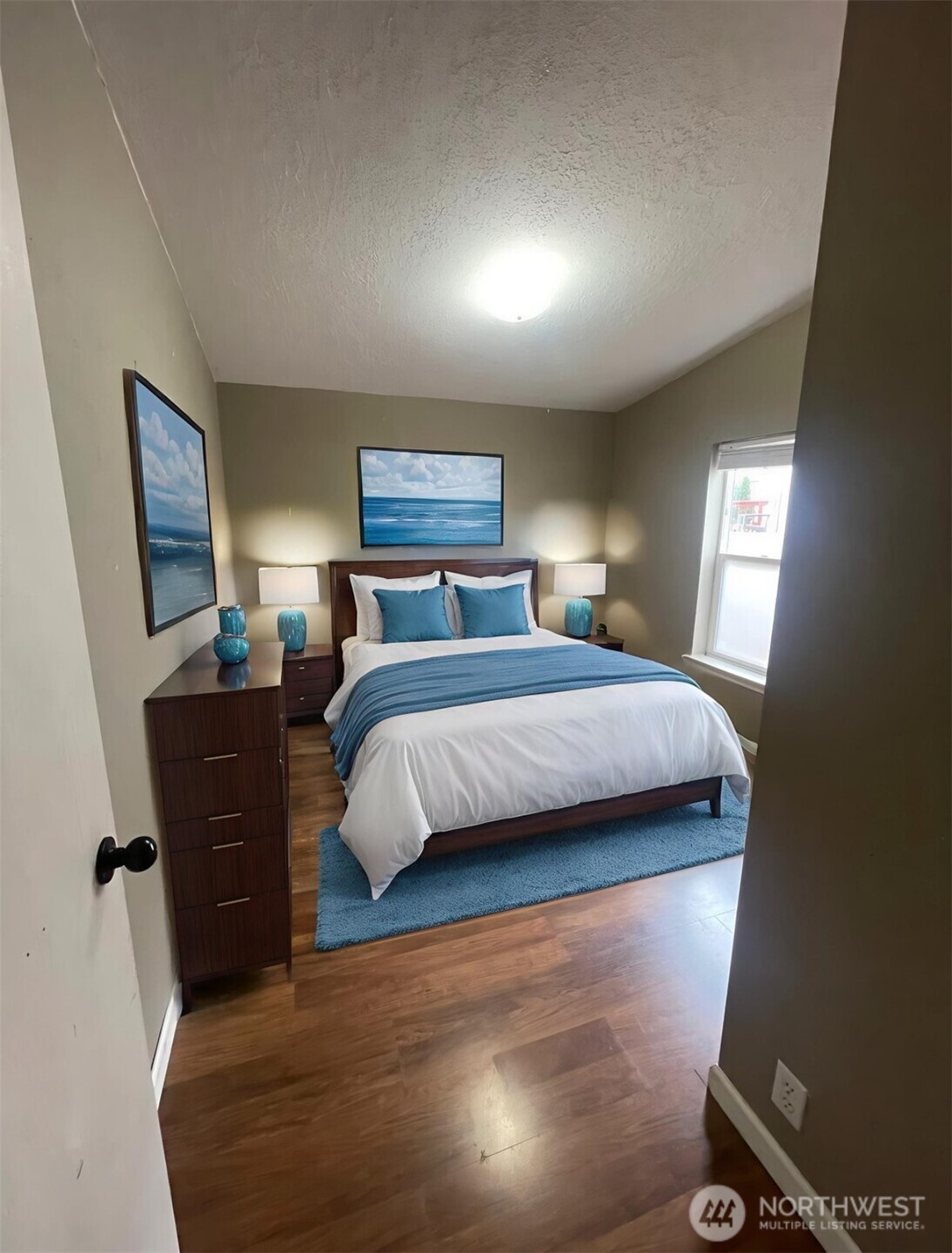 103 Noble Estates Drive Winlock, WA 98596 - Photo 5 of 11 a bedroom with a bed and a mirror