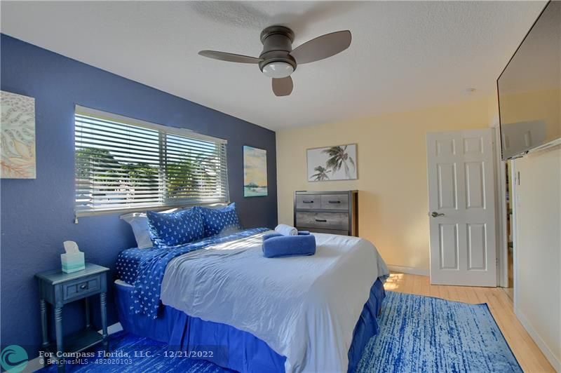 331 Southeast 4th Street Deerfield Beach, FL 33441 - Photo 24 of 37 a bedroom with a bed and a window