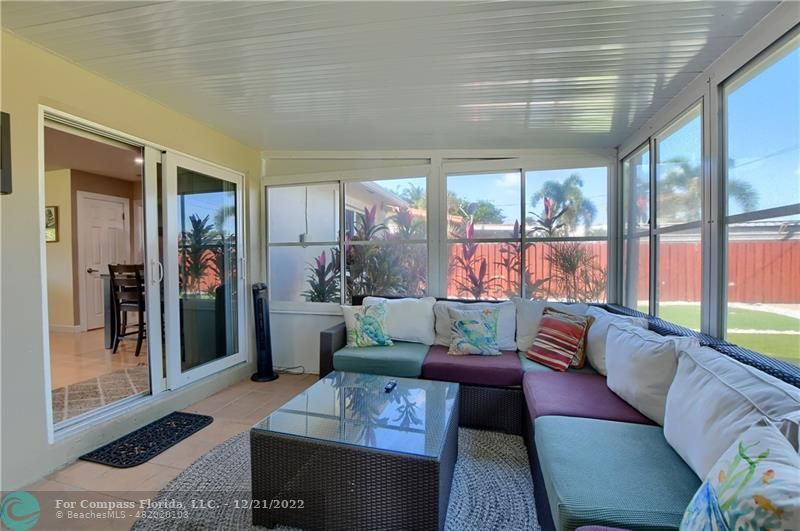 331 Southeast 4th Street Deerfield Beach, FL 33441 - Photo 31 of 37 a living room with furniture and a large window
