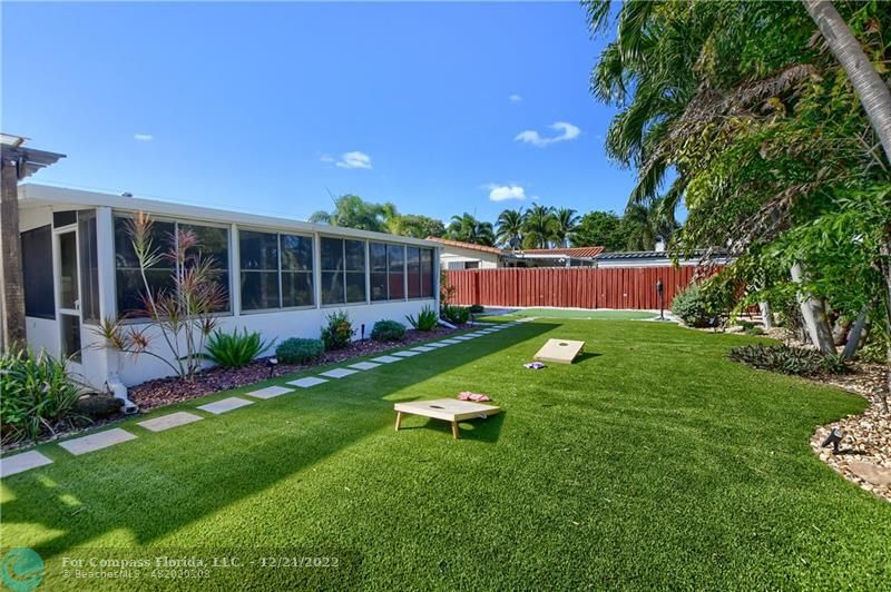 331 Southeast 4th Street Deerfield Beach, FL 33441 - Photo 35 of 37 a garden view with a seating space