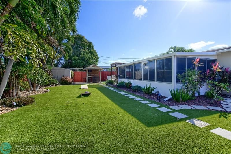 331 Southeast 4th Street Deerfield Beach, FL 33441 - Photo 37 of 37 a view of an house with backyard space and garden